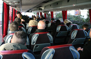 The participants of the International Cognac Summit board the bus.